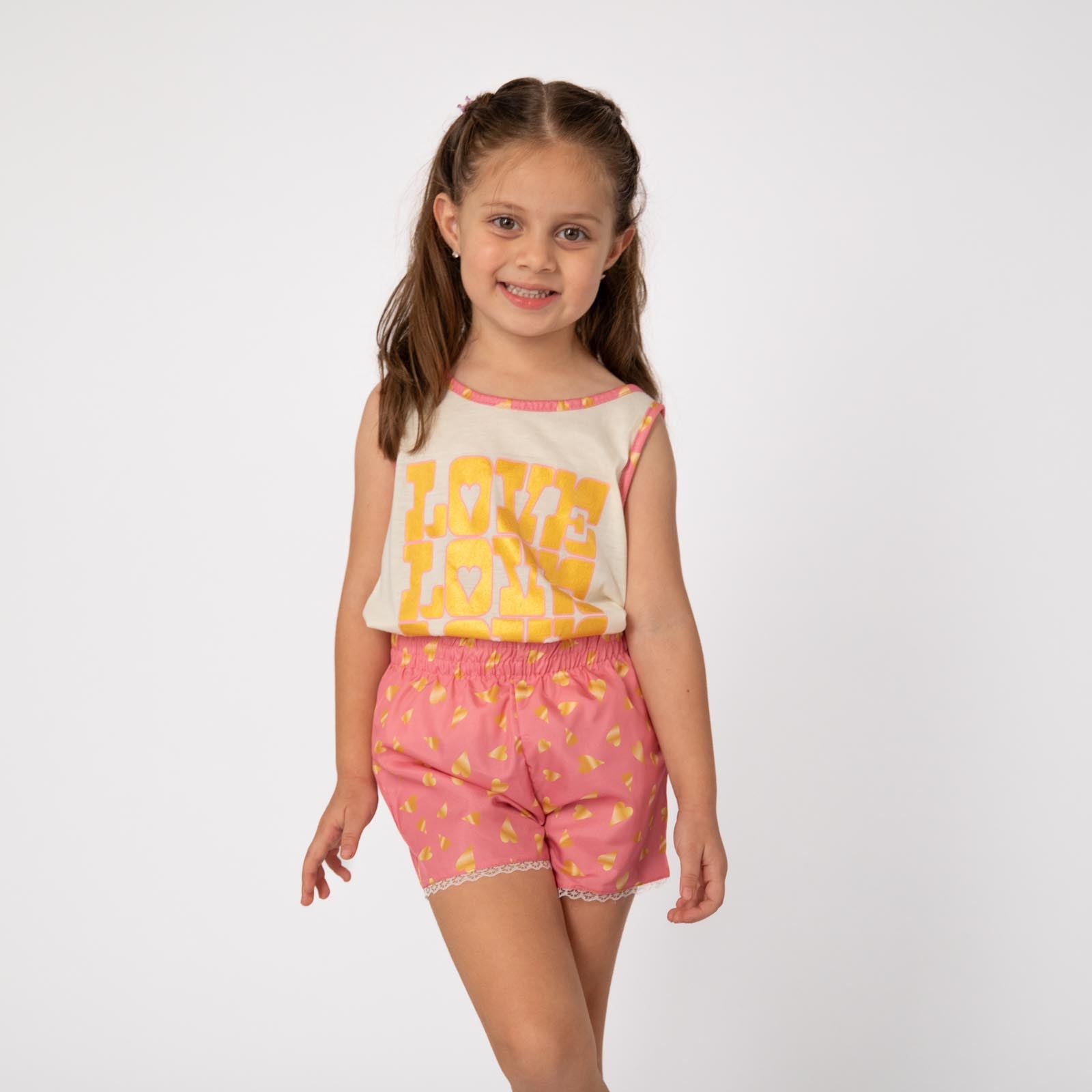 Conjunto de Blusa Love y Shorts con Estampado de Corazones para Niñas 2-10/12  años